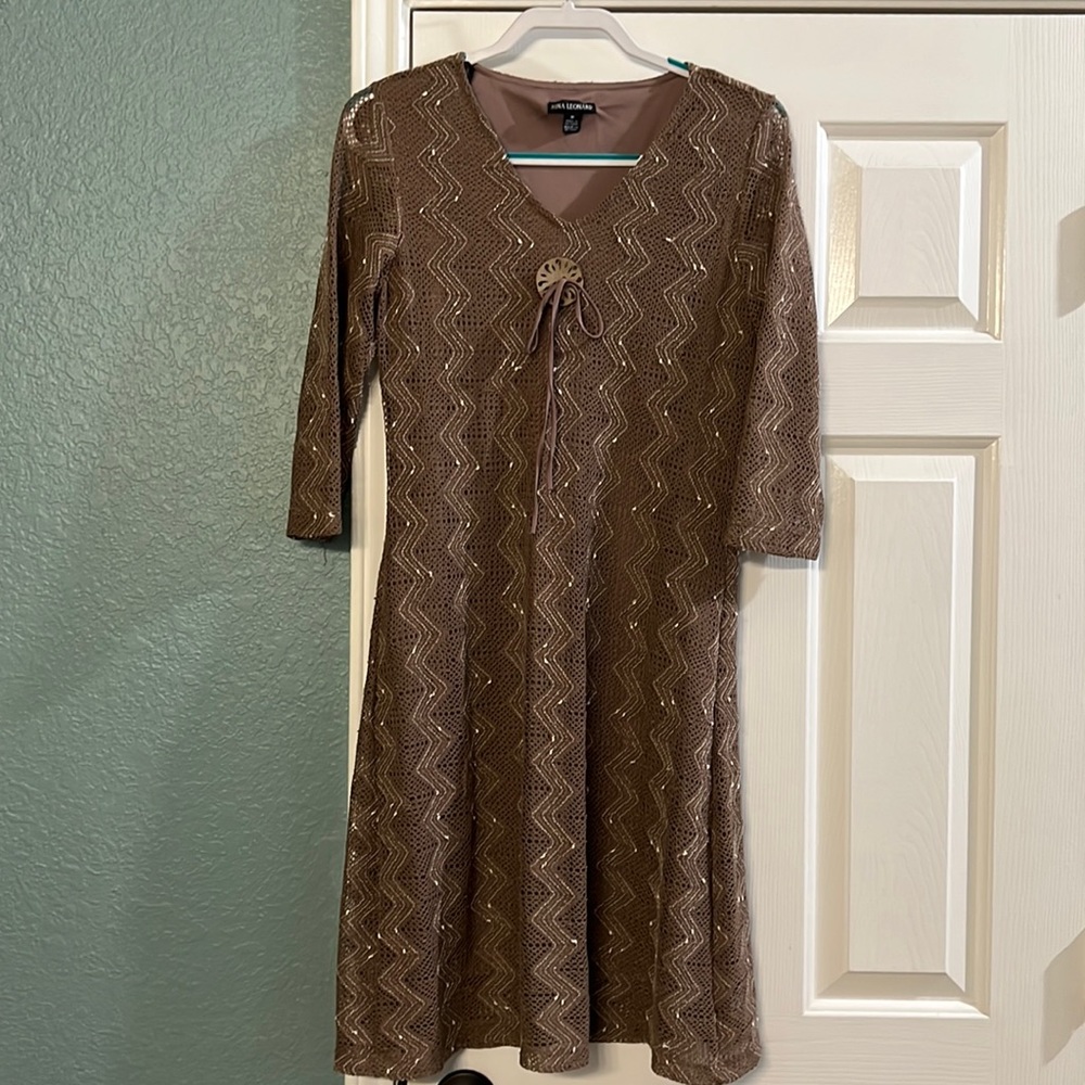 Ready for a good home! Brown & cream colored dress.